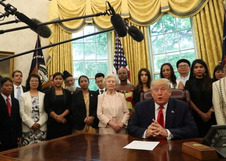 U.S. President Trump meets with victims of religious persecution at the White House in Washington