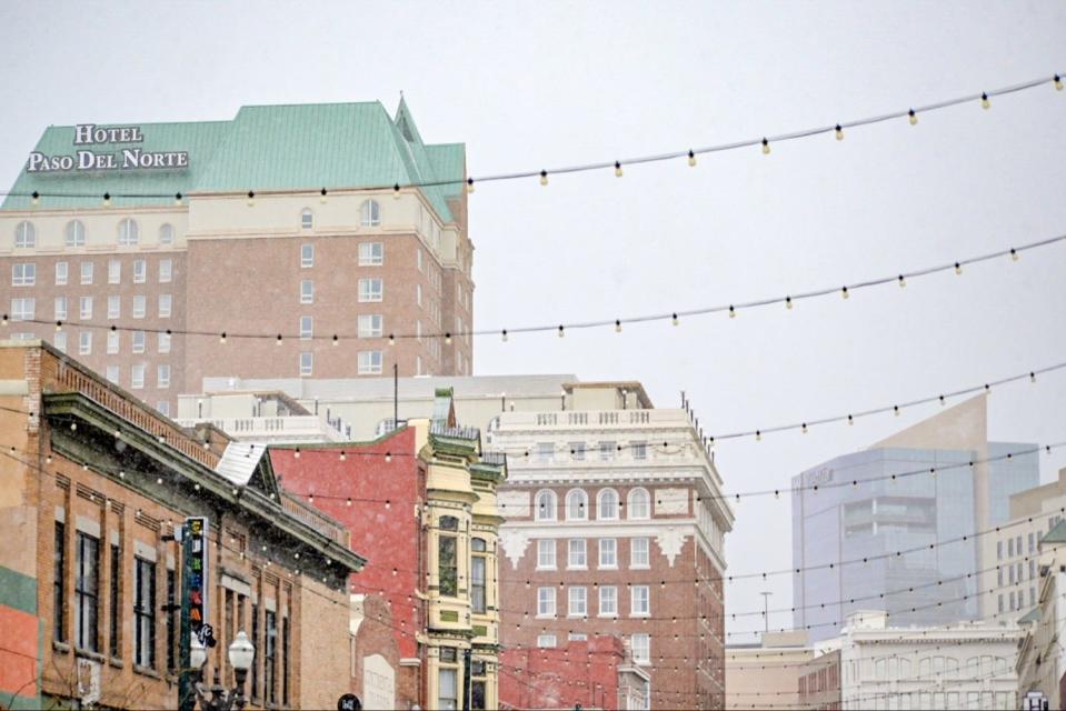 Downtown El Paso is shown during a snowstorm Friday.