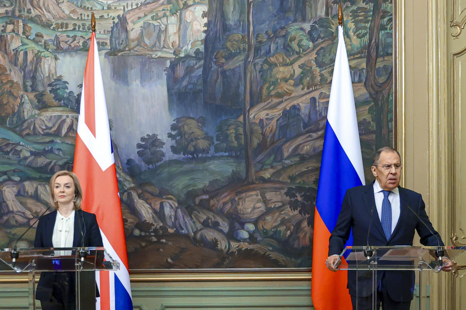 FILE - In this photo released by Russian Foreign Ministry Press Service, Russian Foreign Minister Sergey Lavrov, right, and British Foreign Secretary Liz Truss attend a joint news conference following their talks in Moscow, Russia, Thursday, Feb. 10, 2022. Britain's new leader, Liz Truss, is the child of left-wing parents who grew up to be an admirer of Conservative Prime Minister Margaret Thatcher. Now she is taking the helm as prime minister herself, with a Thatcherite zeal to transform the U.K. One colleague who has known Truss since university says she is “a radical” who wants to “roll back the intervention of the state” in people’s lives, just as Thatcher once did. (Russian Foreign Ministry Press Service via AP, File)