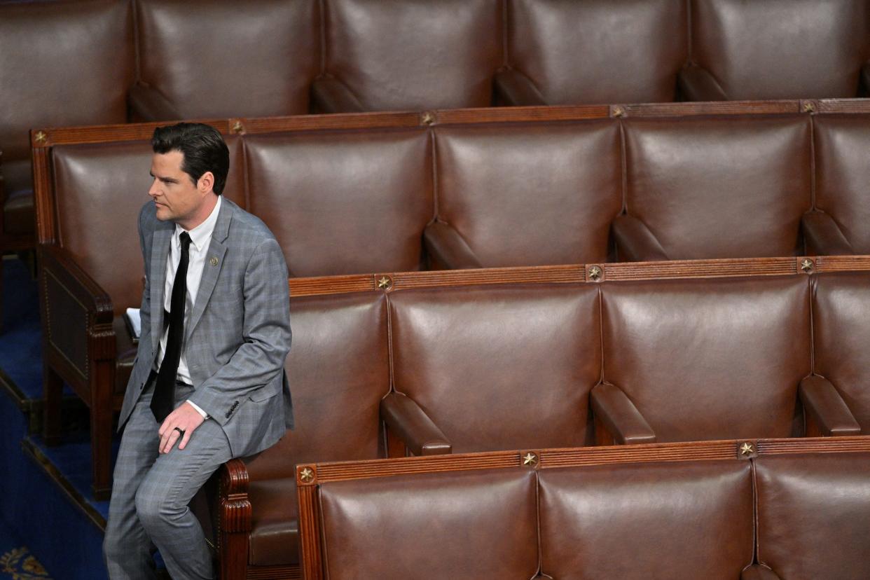 Republican Rep. Matt Gaetz of Florida sits alone on the House floor as lawmakers gather for a 14th round of voting to elect a new speaker on the fourth day of the 118th Congress at the US Capitol in Washington, DC.