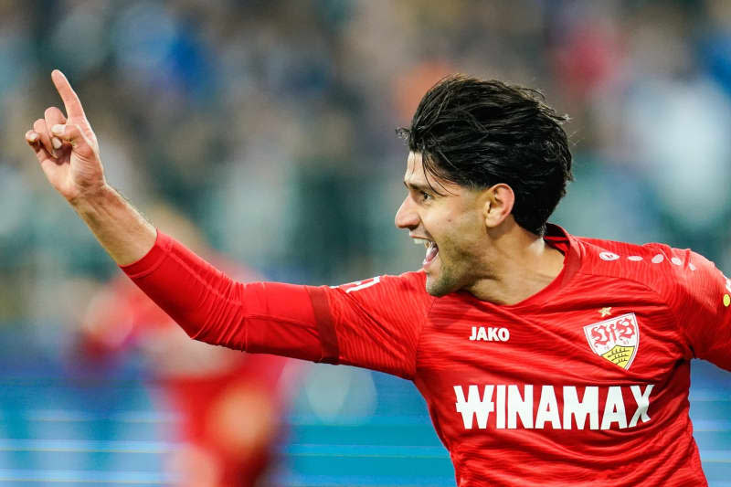 Stuttgart's Mahmoud Dahoud celebrates scoring his side's second goal during the German Bundesliga soccer match between SV Darmstadt 98 and VfB Stuttgart at the Merck-Stadion am Boellenfalltor. Uwe Anspach/dpa