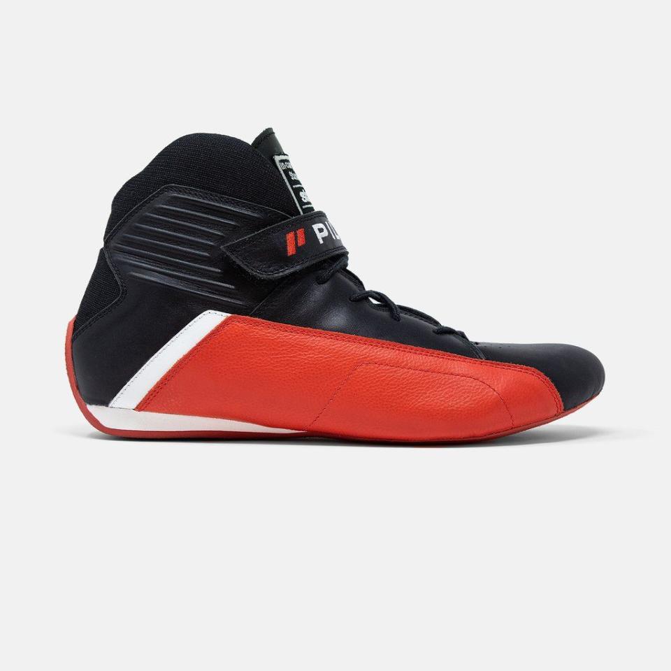 <p><a href="https://piloti.com/collections/all-shoes/products/pinnacle-red" rel="nofollow noopener" target="_blank" data-ylk="slk:Shop Now;elm:context_link;itc:0;sec:content-canvas" class="link ">Shop Now</a></p><p>Pinnacle Racing Boot</p><p>piloti.com</p><p>$265.00</p>