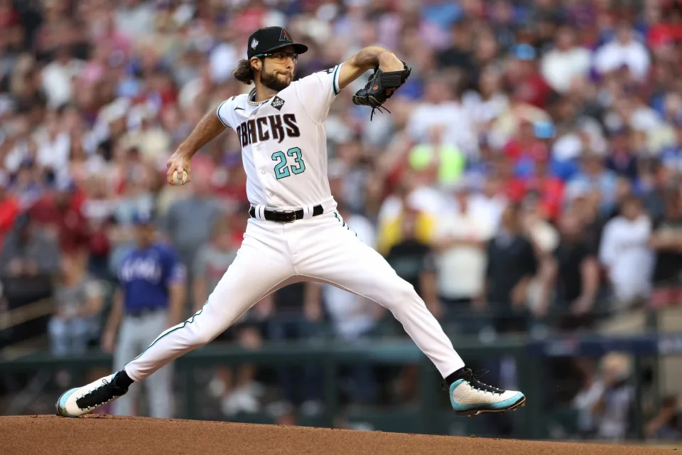 PHOENIX, ARIZONA - NOVEMBER 01: Zac Gallen #23 of the Arizona Diamondbacks pitches in the first inning against the Texas Rangers during Game Five of the World Series at Chase Field on November 01, 2023 in Phoenix, Arizona. (Photo by Harry How/Getty Images)