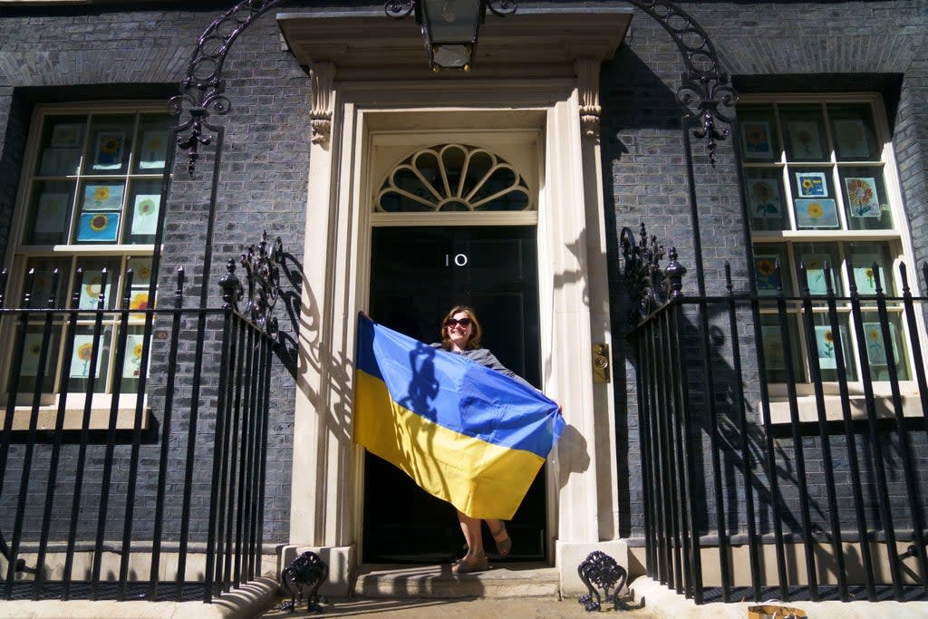 A Ukrainian refugee stands on the doorstep of 10 Downing Street after meeting Prime Minister Boris Johnson (Victoria Jones/PA) (PA Wire)