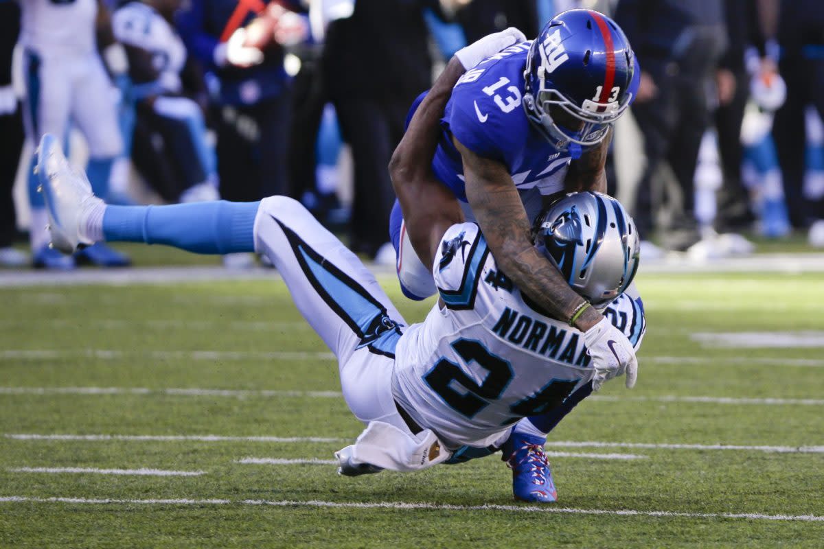 Odell Beckham Jr. and Josh Norman battle last December (AP)