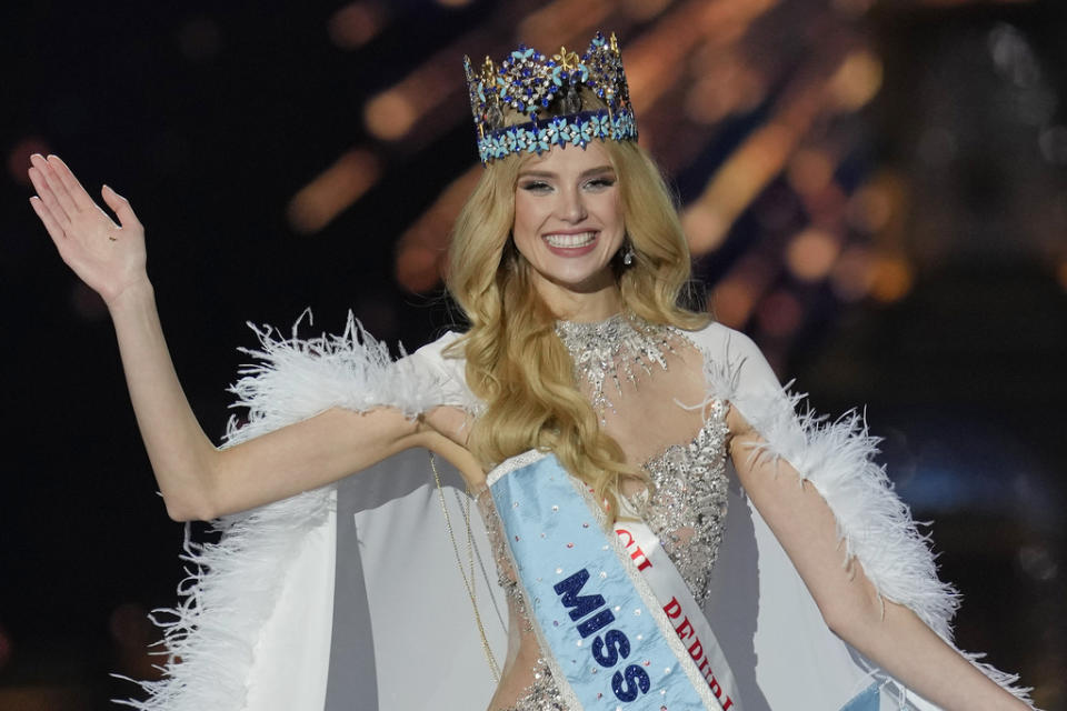 Krystyna Pyszková of Czech Republic waves after she was crowned Miss World in Mumbai, India, Saturday, Mar. 9, 2024. (AP Photo/Rajanish Kakade)