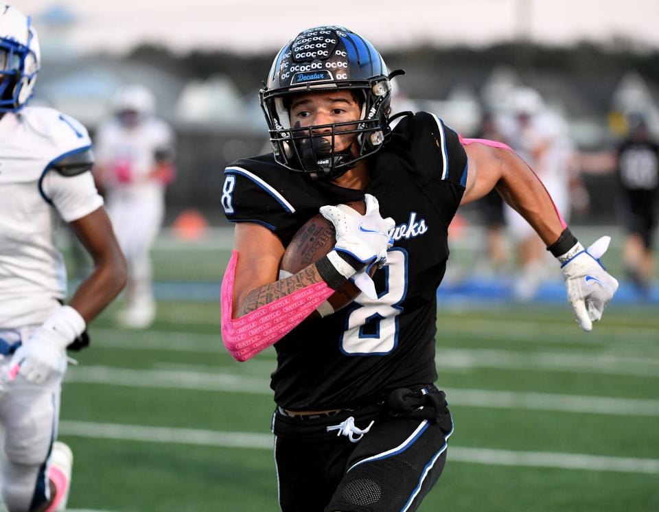 Decatur's Ethan Bradshaw (8) runs for a touchdown against North Caroline Friday, Oct. 13, 2023, in Berlin, Maryland. Decatur defeated North Caroline 44-20.