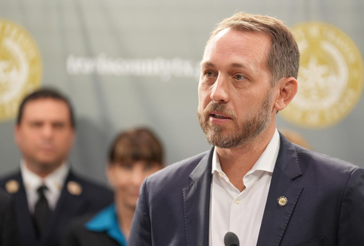 Travis County Judge Andy Brown talks about Local Fiscal Recovery Funds at a news conference at the Travis County Commissioners Court Monday May 8, 2023.