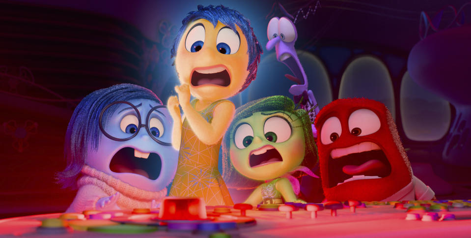 This image released by Disney/Pixar shows, from left, Sadness, voiced by Phyllis Smith, Joy, voiced by Amy Poehler, Disgust, voiced by Liza Lapira, Fear, voiced by Tony Hale and Anger, voiced by Lewis Black, in a scene from "Inside Out 2." (Disney/Pixar via AP)