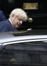 Britain's Prime Minister Boris Johnson leaves 10 Downing Street in London, Thursday, Sept. 26, 2019. An unrepentant Prime Minister Boris Johnson brushed off cries of "Resign!" and dared his foes to try to topple him Wednesday at a raucous session of Parliament, a day after Britain's highest court ruled he acted illegally in suspending the body ahead of the Brexit deadline. (AP Photo/Kirsty Wigglesworth)