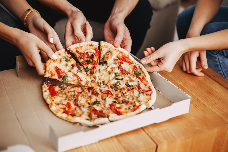 Since it's possible the coronavirus can live up to a day or two on surfaces, it's best to open your food delivery containers with gloved hands. (Photo: Vadym Petrochenko via Getty Images)