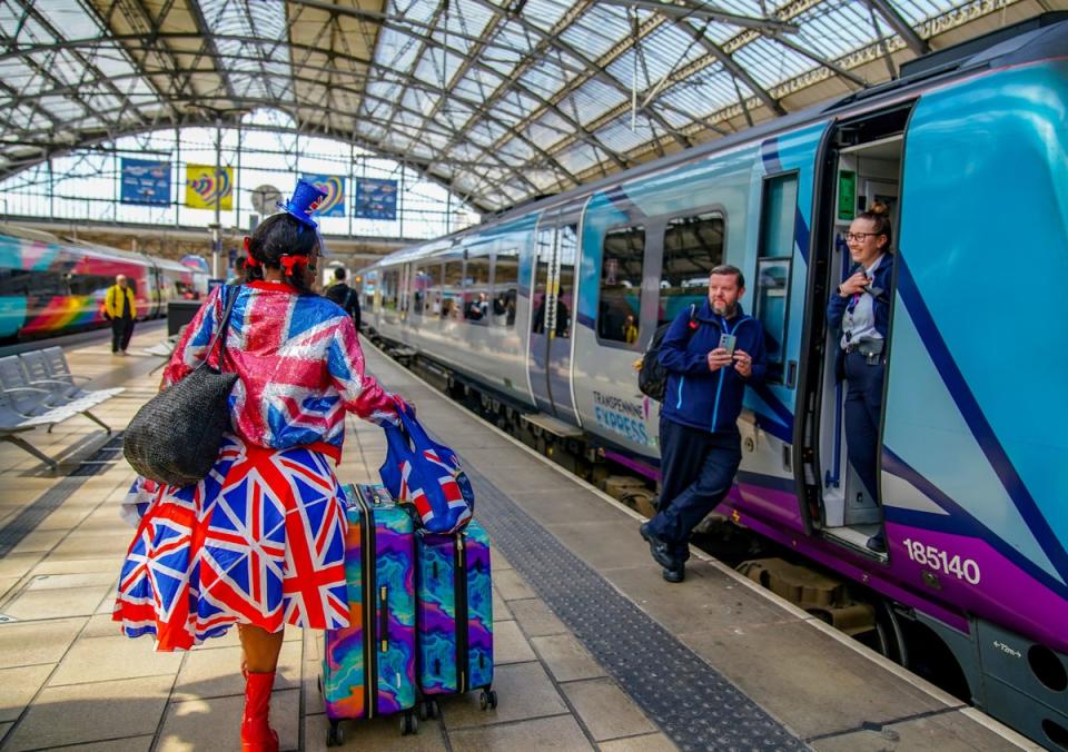 Two trains carrying 170 Eurovision song contest superfans arrive into Liverpool Lime Street train station (PA)