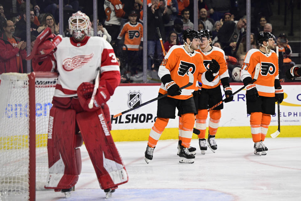 Philadelphia Flyers' Kieffer Bellows (20) celebrates his goal after scoring past Detroit Red Wings goaltender Alex Nedeljkovic during the second period of an NHL hockey game, Saturday, March 25, 2023, in Philadelphia. (AP Photo/Derik Hamilton)