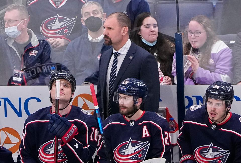 Columbus Blue Jackets head coach Brad Larsen watches during the second period of the NHL hockey game against the Calgary Flames at Nationwide Arena in Columbus on Wednesday, Jan. 26, 2022. 