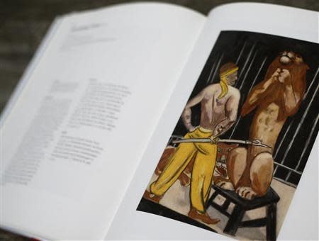 File photo of a print of the painting 'Lion-Tamer' by artist Max Beckmann is displayed in a book about the German expressionist at Lempertz auction house in Cologne November 4, 2013. REUTERS/Wolfgang Rattay/Files