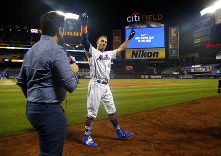 Jul 11, 2018; New York City, NY, USA; New York Mets center fielder Brandon Nimmo (9) celebrates after hitting a three run home run in the tenth inning to defeat the Philadelphia Phillies 3-0 at Citi Field. Mandatory Credit: Noah K. Murray-USA TODAY Sports