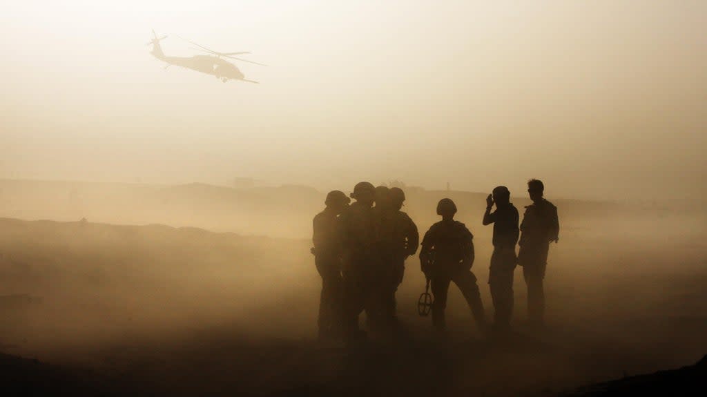 British troops conduct IED training in dusty conditions at Camp Bastion, Helmand Province, Afghanistan (PA) (PA Archive)