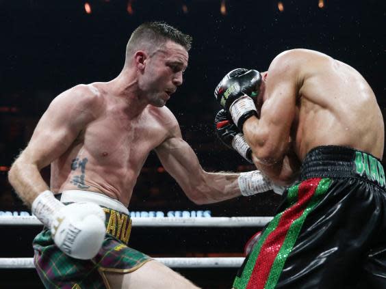 Josh Taylor beat Ivan Baranchyk to claim the IBF light welterweight championship (EPA)