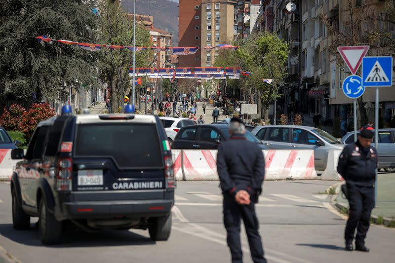 Italian Carabinieri part of the NATO-led peacekeeping force stand guard in North Mitrovica