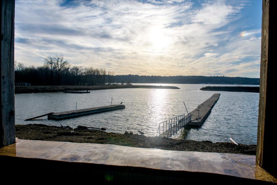 Charlie's at Sunset Cove features a scenic view of the Illinois River with picturesque sunsets.