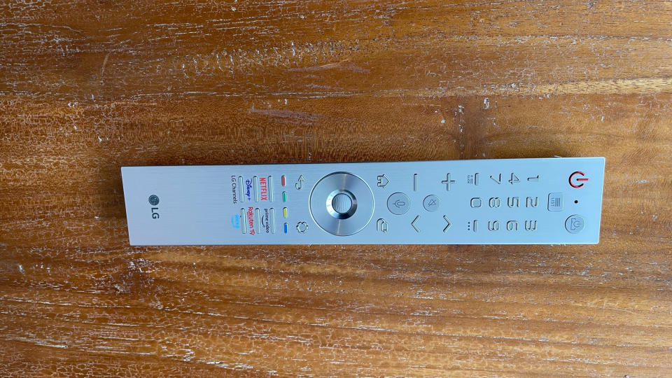 LG Z3 OLED TV remote control on wooden table