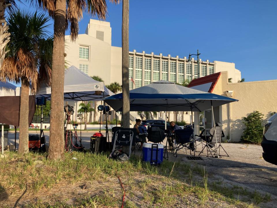 Television media set up outside the Alto Lee Adams Sr. U.S. Courthouse in Fort Pierce Aug. 10, 2023, in advance of arraignments for former President Donald Trump's body guard, Walt Nauta and his Mar-a-Lago property manager Carlos de Oliveira to new charges added July 27 to an indictment in the classified documents case.