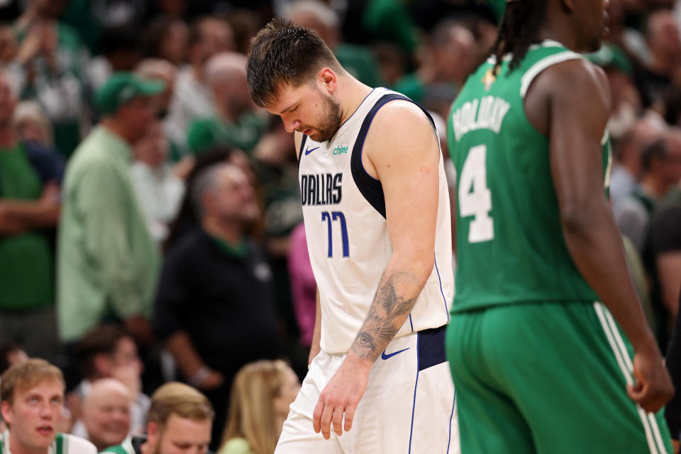 BOSTON, MASSACHUSETTS - JUNE 17: Luka Doncic #77 of the Dallas Mavericks reacts during the fourth quarter of Game Five of the 2024 NBA Finals against the Boston Celtics at TD Garden on June 17, 2024 in Boston, Massachusetts. NOTE TO USER: User expressly acknowledges and agrees that, by downloading and or using this photograph, User is consenting to the terms and conditions of the Getty Images License Agreement. (Photo by Elsa/Getty Images)