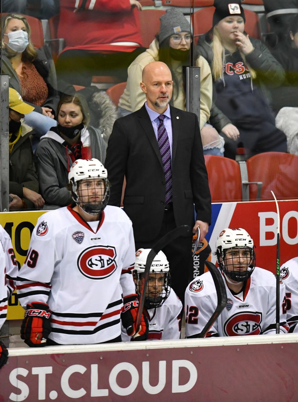 St. Cloud State head coach Brett Larson watches from the bench during the first period of the game Friday, Jan. 21, 2022, at The Herb Brooks National Hockey Center in St Cloud. Larson begins his fifth season as head coach for the Huskies this year.