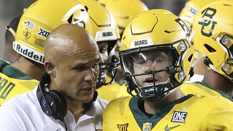 Baylor coach Dave Aranda speaks with Blake Shapen, who is pulled from game against Texas State Saturday, Sept. 3, 2023, in Waco, Texas.