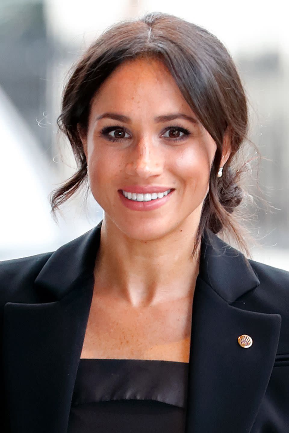 <p>While the <a rel="nofollow noopener" href="https://www.harpersbazaar.com/uk/beauty/hair/g20002256/meghan-markles-beauty-transformation/" target="_blank" data-ylk="slk:Duchess of Sussex's signature bun;elm:context_link;itc:0;sec:content-canvas" class="link ">Duchess of Sussex's signature bun</a> hasn't disappeared since she married into the royal family, there are tricks she now uses to avoid it looking too informal. The secret is to add volume to your hair without too much messy texture using a volumising mousse, such as Bumble and bumble's <a rel="noopener" href="https://fave.co/2Cn8IoF" target="_blank" data-ylk="slk:Bb. Thickening Foam;elm:context_link;itc:0;sec:content-canvas" class="link ">Bb. Thickening Foam</a>, £24. Then, scoop your hair into a low bun, secured at the nape of your neck with a Silke London <a rel="noopener" href="https://fave.co/2oEshz0" target="_blank" data-ylk="slk:Hair Tie;elm:context_link;itc:0;sec:content-canvas" class="link ">Hair Tie</a>, £26 for 6, with some face-framing tendrils left out at the front.</p>