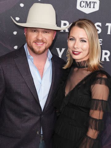 <p>Larry McCormack/Variety/Getty</p> Cody Johnson and Brandi Johnson at the 2022 CMT Artists of the Year ceremony.