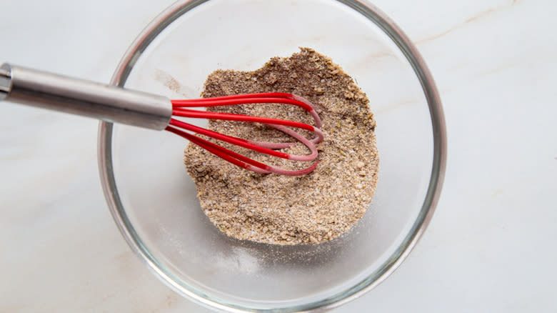 mixing spices in bowl