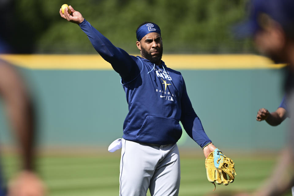 Tampa Bay Rays third baseman Yandy Diaz throws during workouts the day before their wild card baseball playoff game against the Cleveland Guardians, Thursday, Oct. 6, 2022, in Cleveland. (AP Photo/David Dermer)