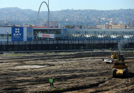 Construction on the area around the port of entry from Mexico to the United States continues next to the border wall in San Ysidro, California, U.S., January 25, 2017. REUTERS/Mike Blake