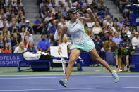 Iga Swiatek, of Poland, reacts after scoring a point against Aryna Sabalenka, of Belarus, during the semifinals of the U.S. Open tennis championships, Thursday, Sept. 8, 2022, in New York. (AP Photo/Charles Krupa)