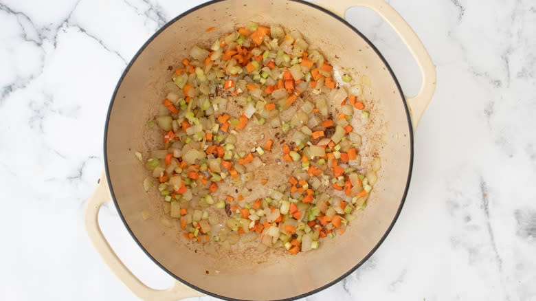 carrots onions celery in pot