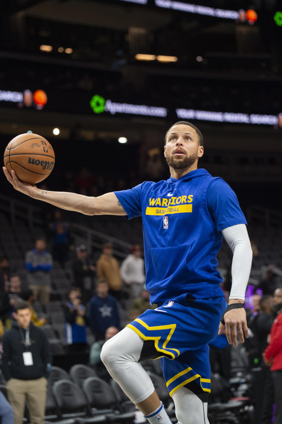 Golden State Warriors guard Stephen Curry shoots during warmups before an NBA basketball game against the Atlanta Hawks, Friday, March 17, 2023, in Atlanta. (AP Photo/Hakim Wright Sr.)