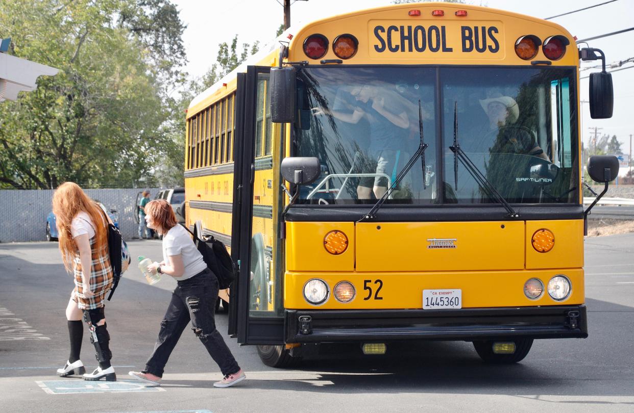 A school bus drops off students outside the Shasta-Trinity ROP on Eastside Road in Redding. Some school board races in Shasta County are crowded with candidates. Voters will decide on those races on Nov. 8.