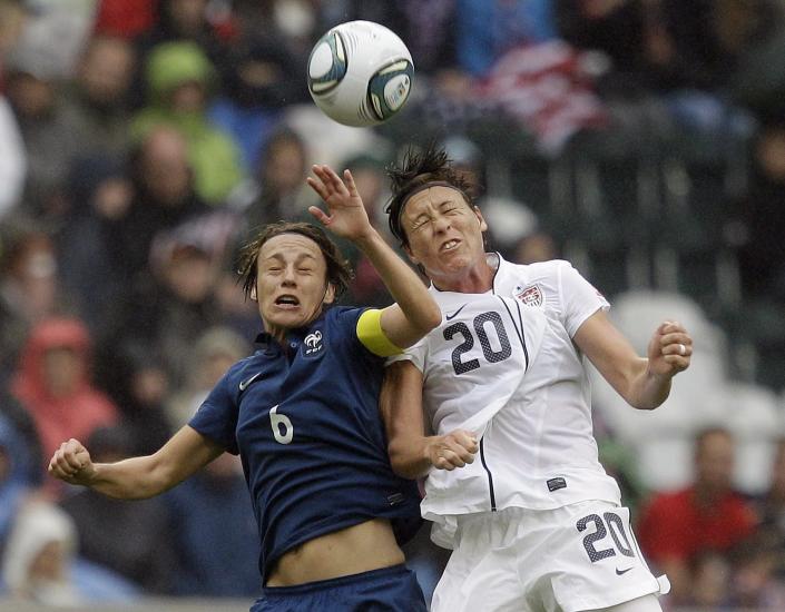 United States' Abby Wambach goes up for a header against France's Sandrine Soubeyrand during the semifinal match between France and the United States at the Women’s Soccer World Cup in Moenchengladbach, Germany, Wednesday, July 13, 2011. (AP Photo/Marcio Jose Sanchez)