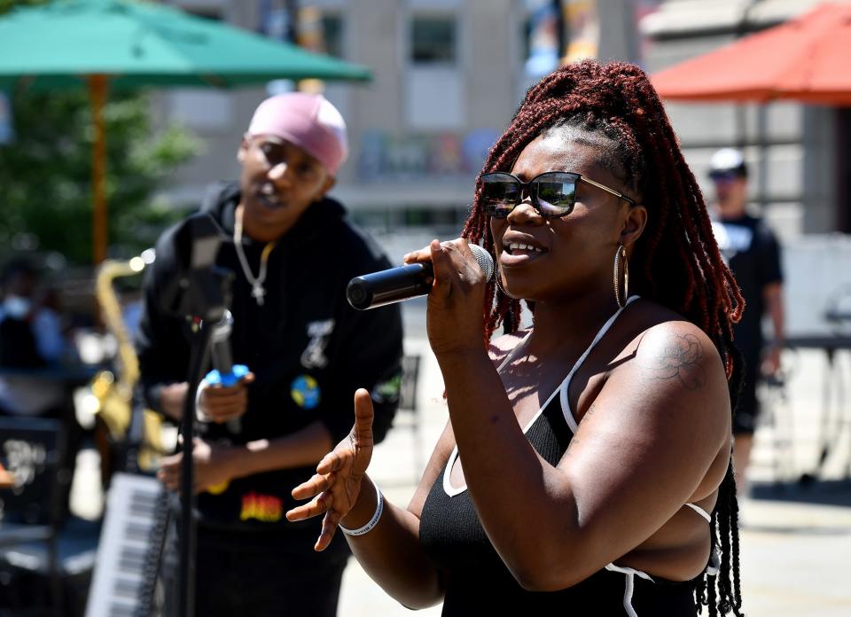 Nathanael Abaidoo, left, and Willette Offori perform Saturday as Willette and Sensei N8 on Worcester Common during the Black Music Festival.