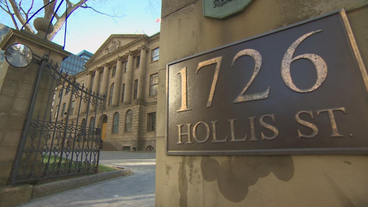 A 69-year-old woman who was fired by Premier Tim Houston's chief of staff last October is suing the premier's office for wrongful dismissal and accusing the office of targeting and defaming her. (Robert Guertin/CBC - image credit)