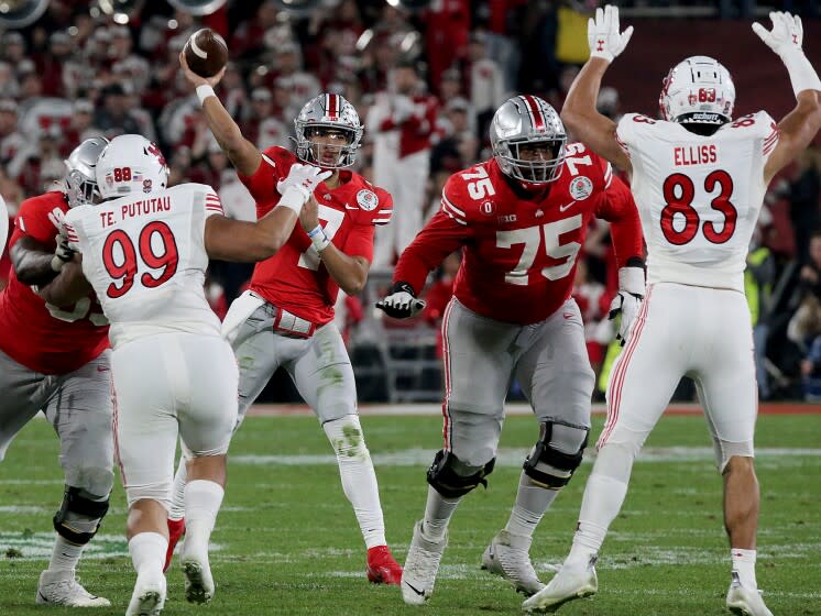 PASADENA, CALIF. - JAN. 1, 2022. Ohio State quarterback C.J. Stroud throws a pass.