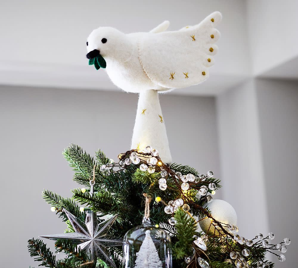 <p><a href="https://go.redirectingat.com?id=74968X1596630&url=https%3A%2F%2Fwww.potterybarn.com%2Fproducts%2Ffelt-dove-tree-topper%2F&sref=https%3A%2F%2Fwww.housebeautiful.com%2Fentertaining%2Fholidays-celebrations%2Fg45735039%2Fchristmas-tree-topper-ideas%2F" rel="nofollow noopener" target="_blank" data-ylk="slk:Shop Now;elm:context_link;itc:0;sec:content-canvas" class="link rapid-noclick-resp">Shop Now</a></p><p>Felt Dove Tree Topper</p><p>$39.50</p>