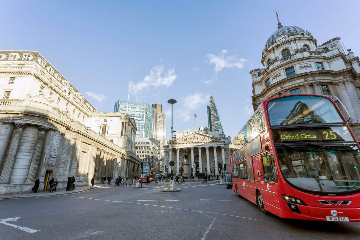 The first film is sealed with a kiss on Threadneedle Street (Getty Images)