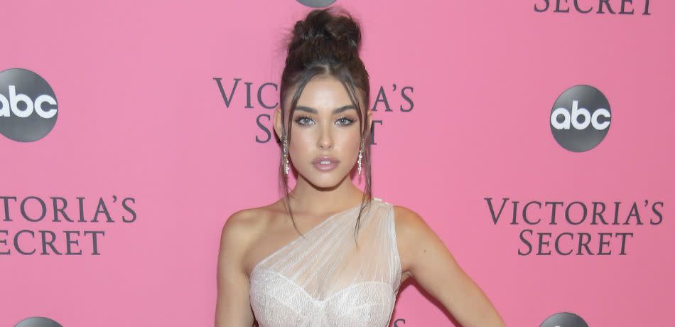 Madison Beer poses on the pink carpet while attending the 2018 Victoria's Secret Fashion Show.