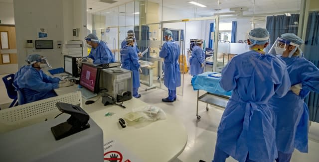 Health workers wearing full personal protective equipment 