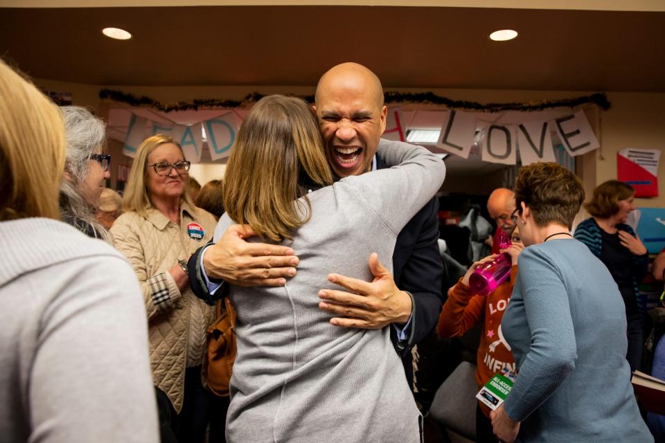New Jersey Senator and 2020 Democratic presidential candidate Cory Booker attends a holiday celebration at his Urbandale campaign office on Monday, Dec. 23, 2019, in Urbandale. 