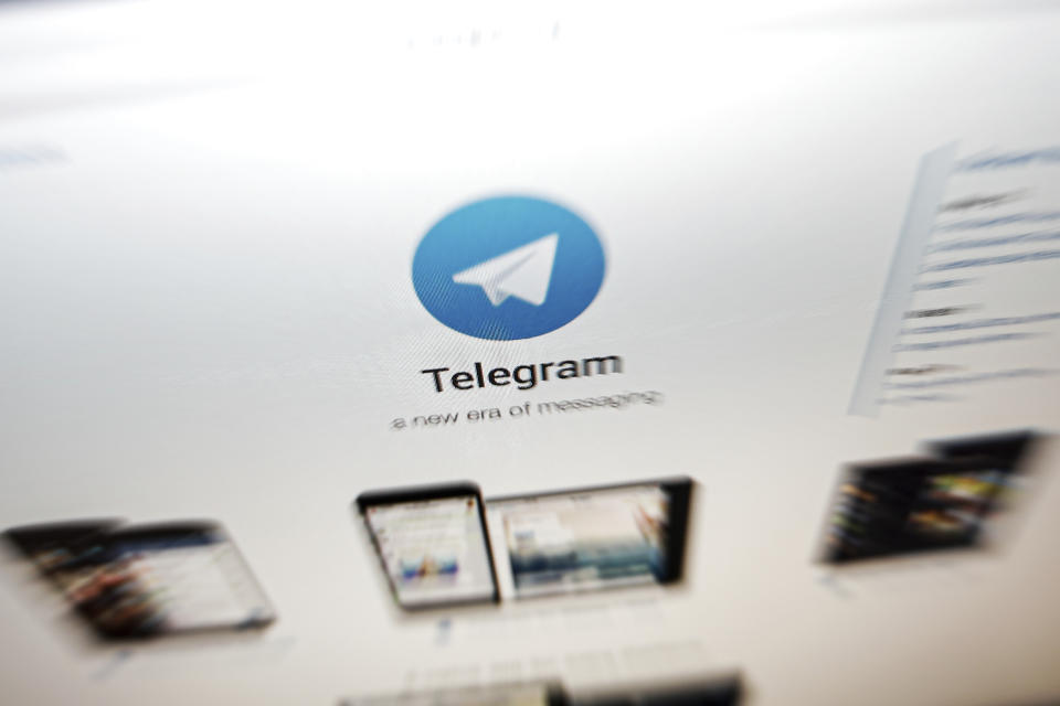 FILE - In this Thursday, June 13, 2019, file photo, the website of the Telegram messaging app is seen on a computer's screen in Beijing. In early January 2021, encrypted messaging apps Signal and Telegram are seeing huge upticks in downloads from Apple and Google's app stores, while WhatsApp's growth is on the decline following a privacy fiasco where the company was forced to clarify a message it sent to users. (AP Photo/Andy Wong, File)