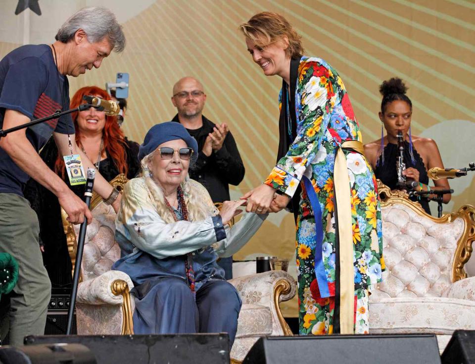 Brandi Carlile introduces Joni Mitchell for a special Joni Jam at the 2022 Newport Folk Festival at Fort Adams State Park on July 24, 2022.