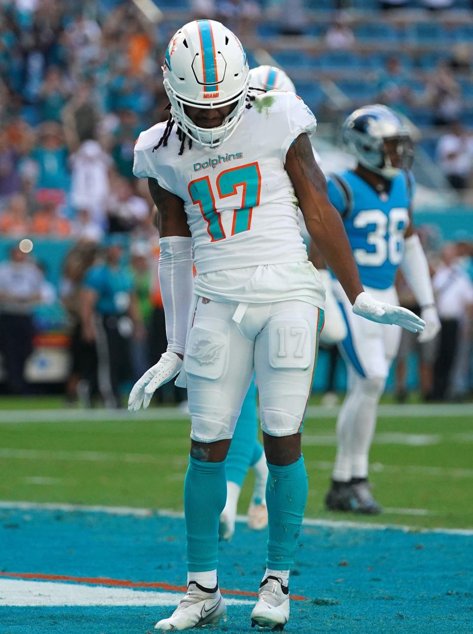 Nov 28, 2021; Miami Gardens, Florida, USA; Miami Dolphins wide receiver Jaylen Waddle (17) does the Waddle waddle after scoring a touchdown against the Carolina Panthers during the first half at Hard Rock Stadium. Mandatory Credit: Jasen Vinlove-USA TODAY Sports